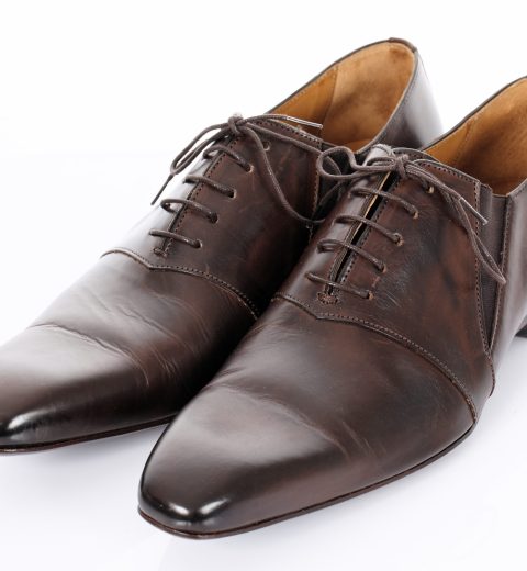 Brown shoes isolated on the white background in studio